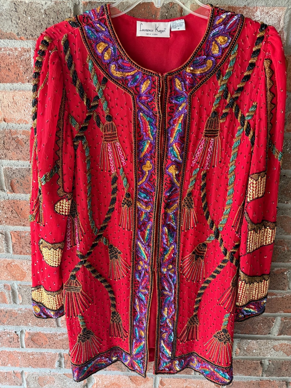 Vintage 1980s/1990s Laurence Kazar New
York red silk beaded long evening jacket.